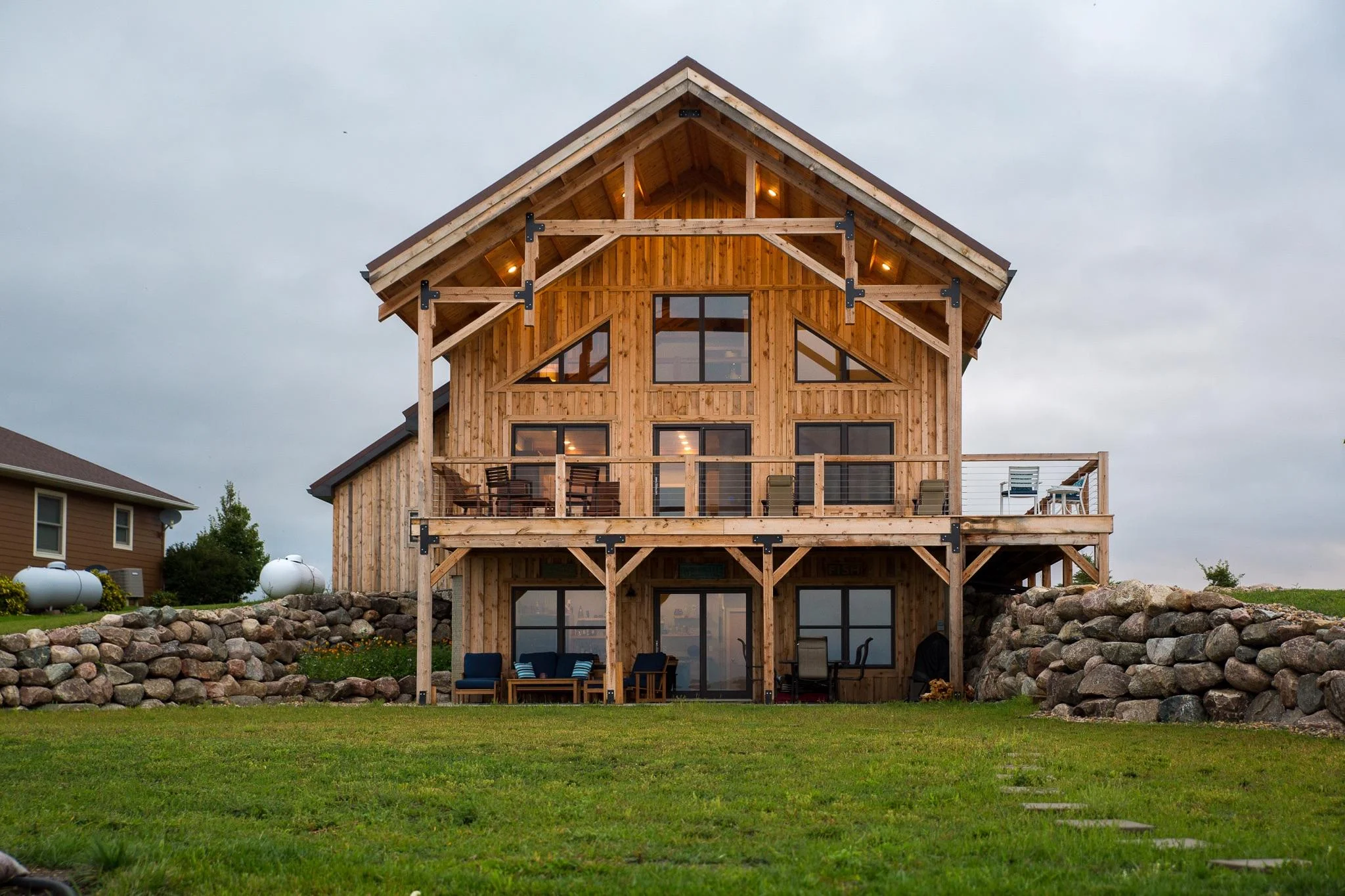 Exterior view of timber frame lake home